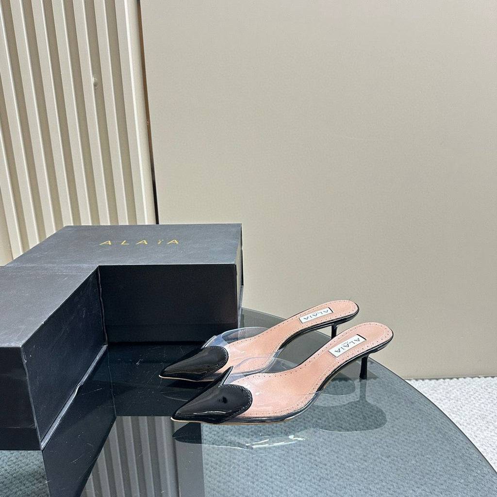 Black LC Mules In Patent Leather
