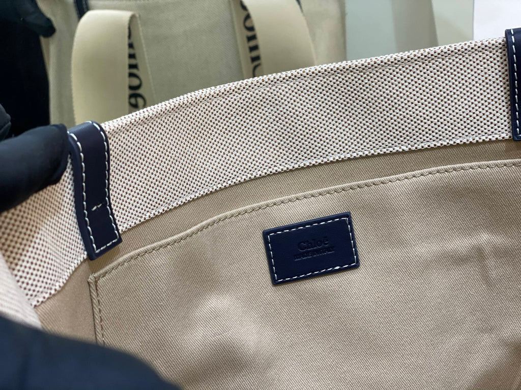CW medium navy leather-trimmed cotton-canvas tote