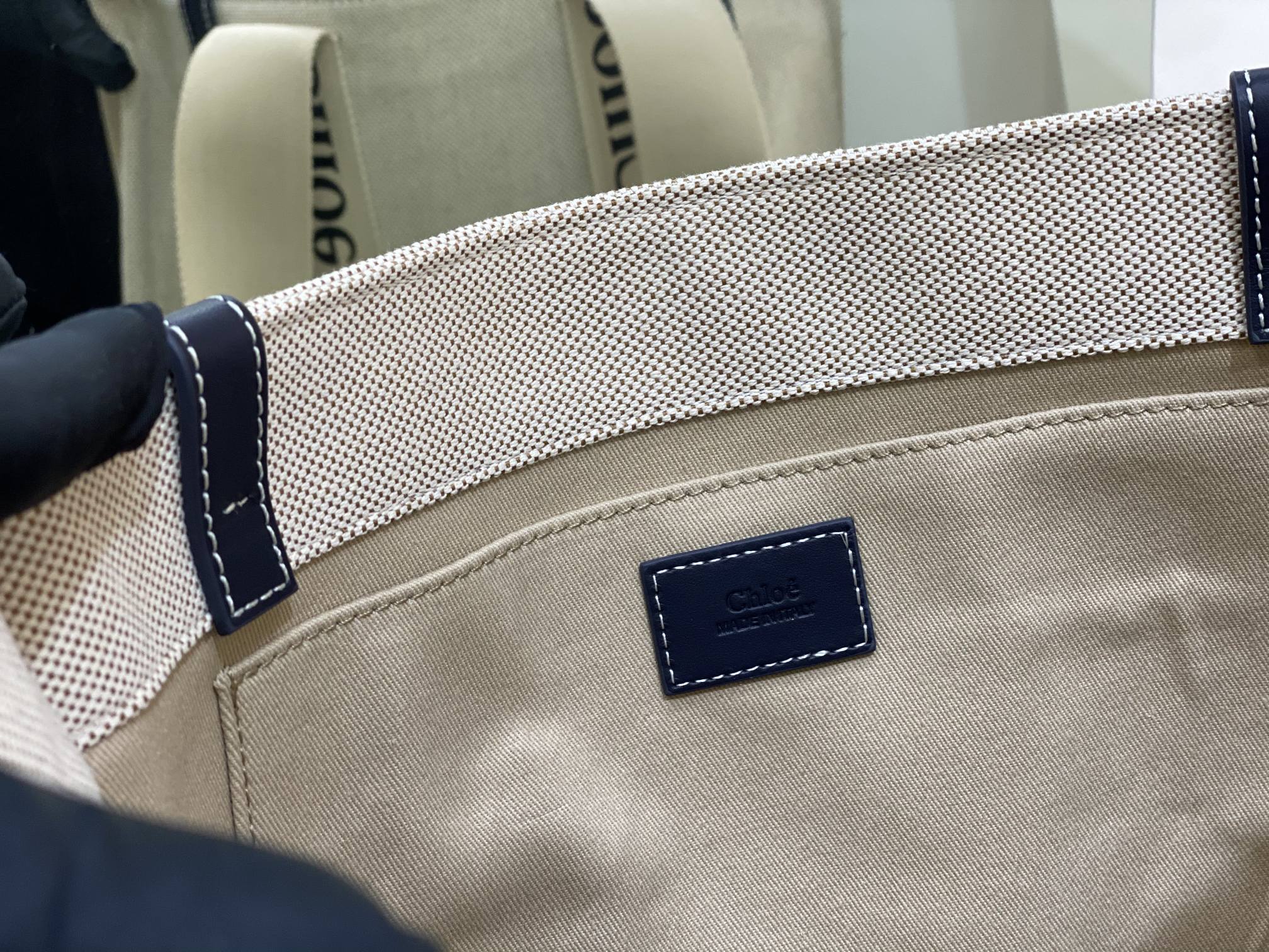 CW medium navy leather-trimmed cotton-canvas tote