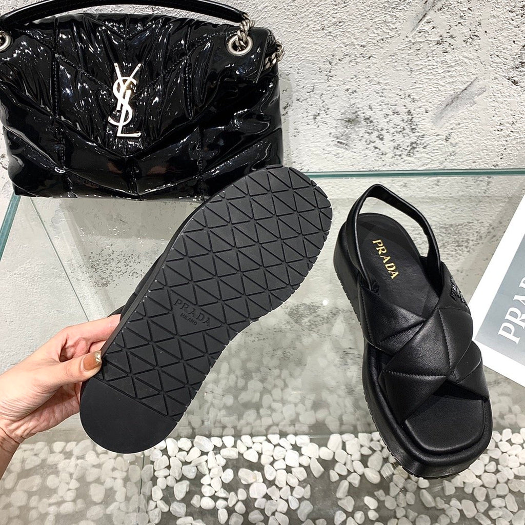 Black quilted flatform sandals