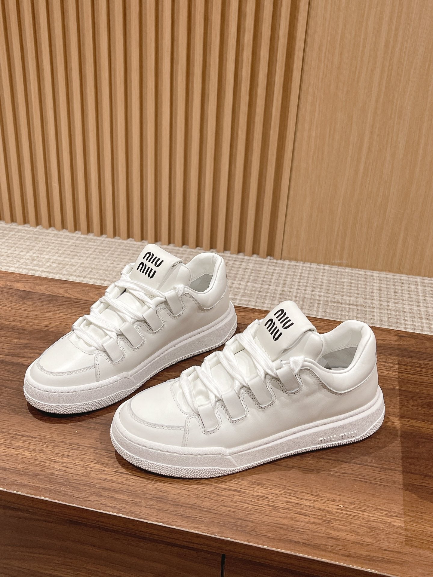 White M leather sneakers