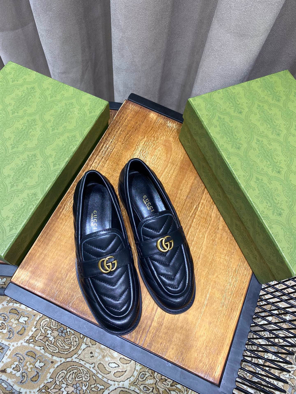 Black chevron matelassé loafers
