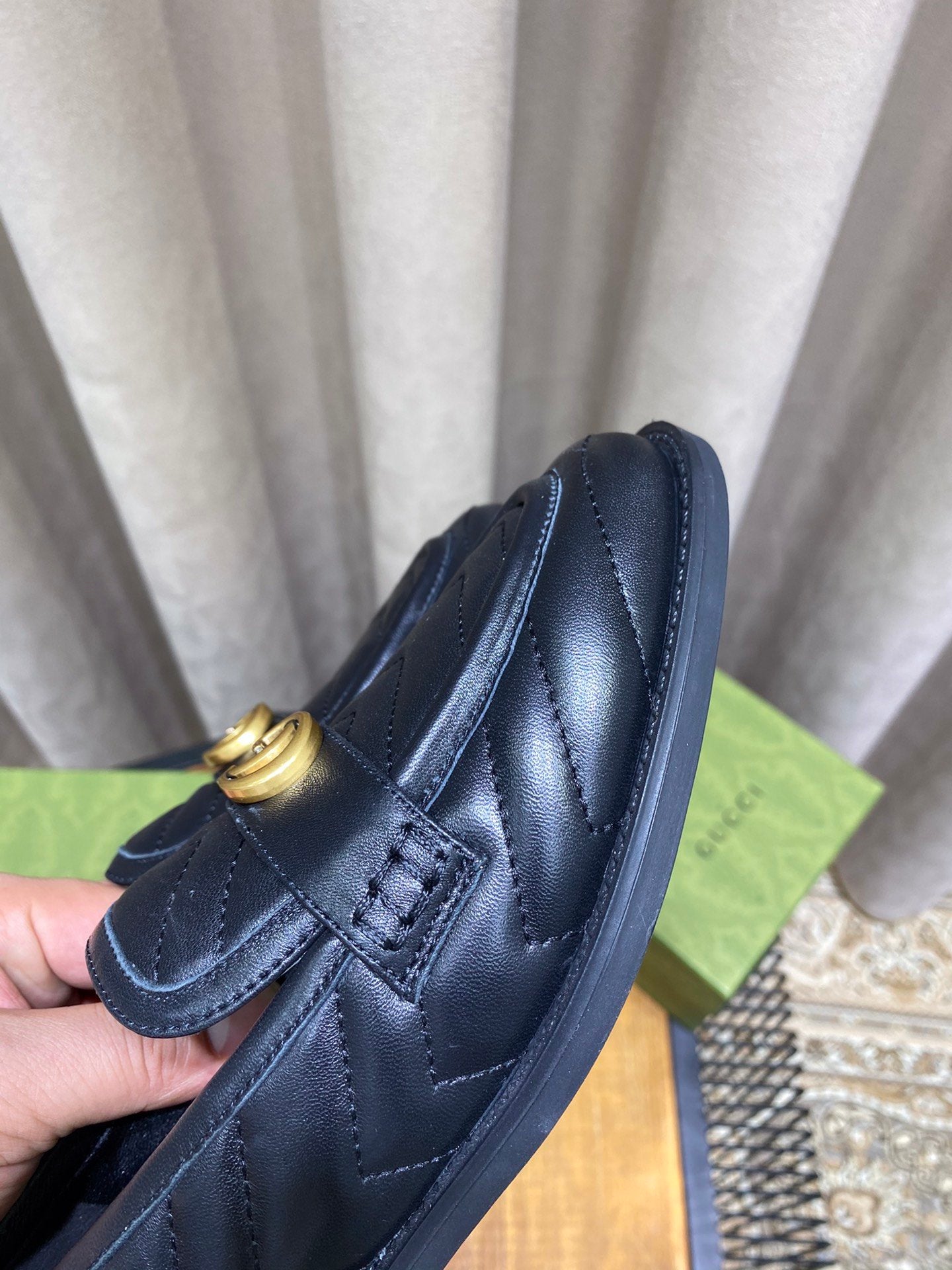 Black chevron matelassé loafers