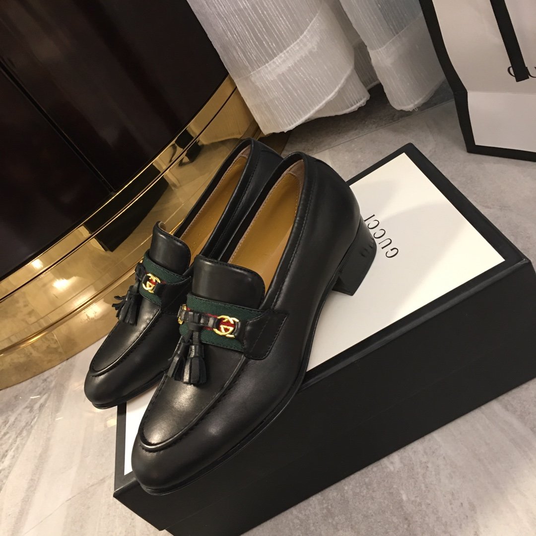 Black loafer with web