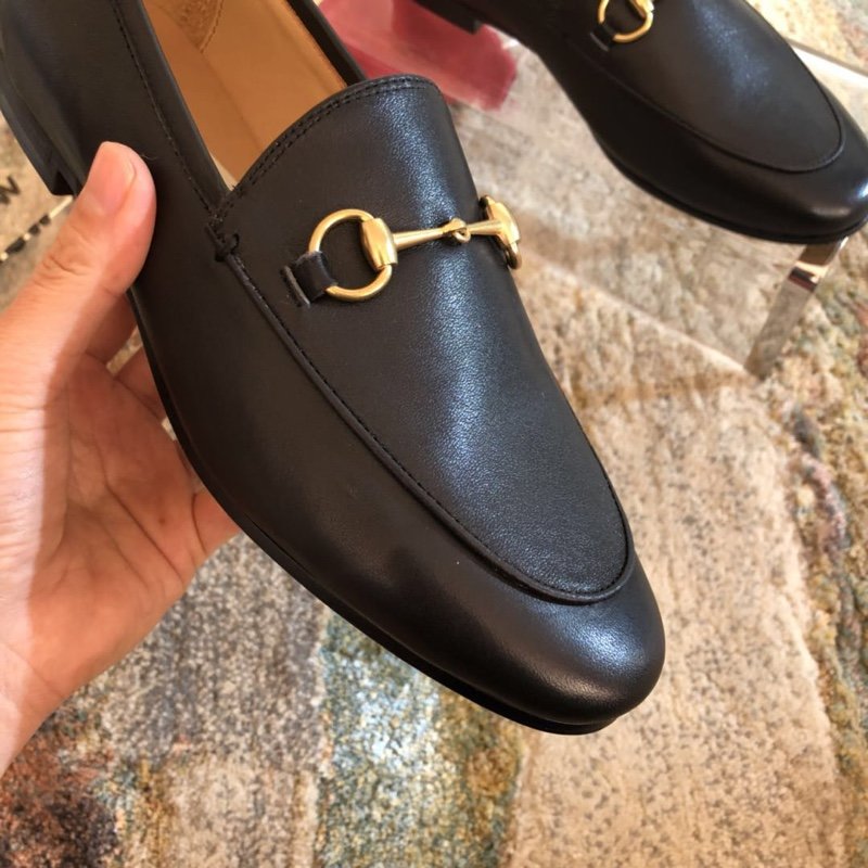 Black GJ leather collapsible-heel loafers