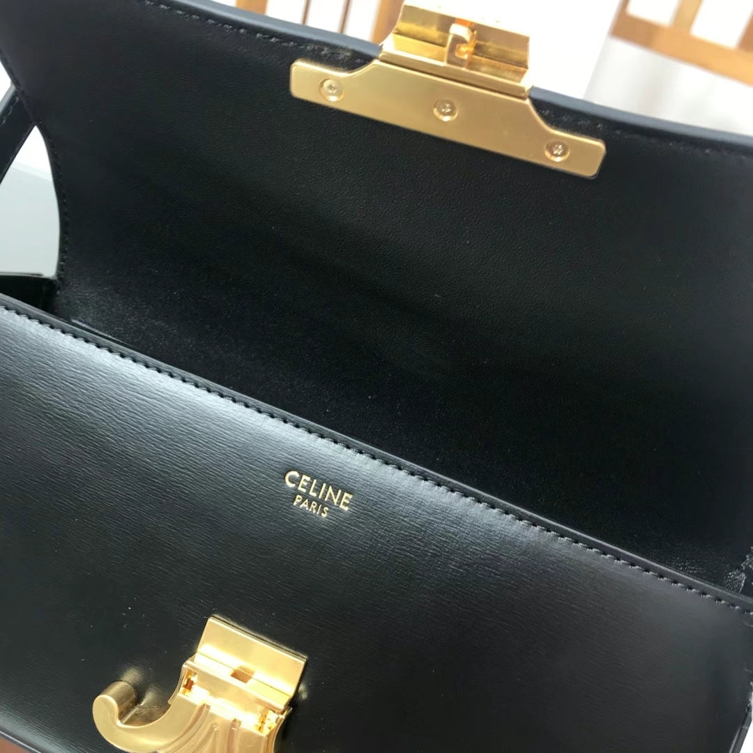 Black triomphe shoulder bag