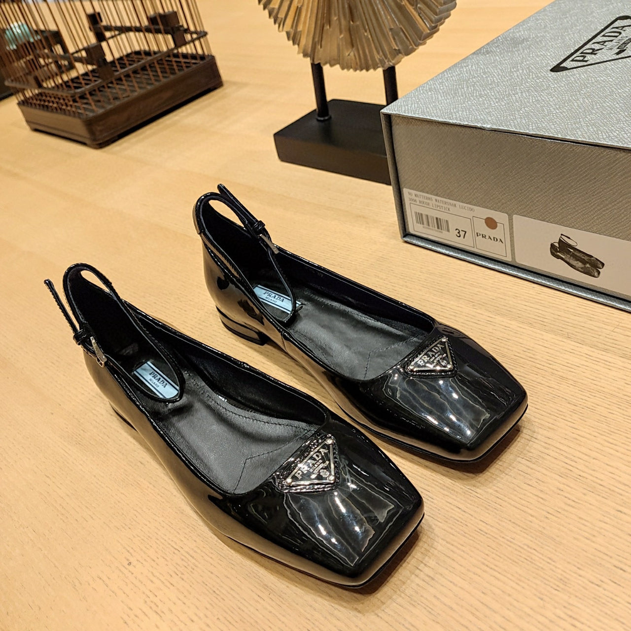 Black patent leather ballerinas