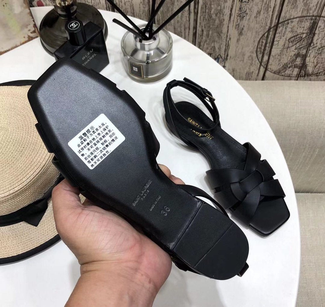 YT flat sandals in black leather