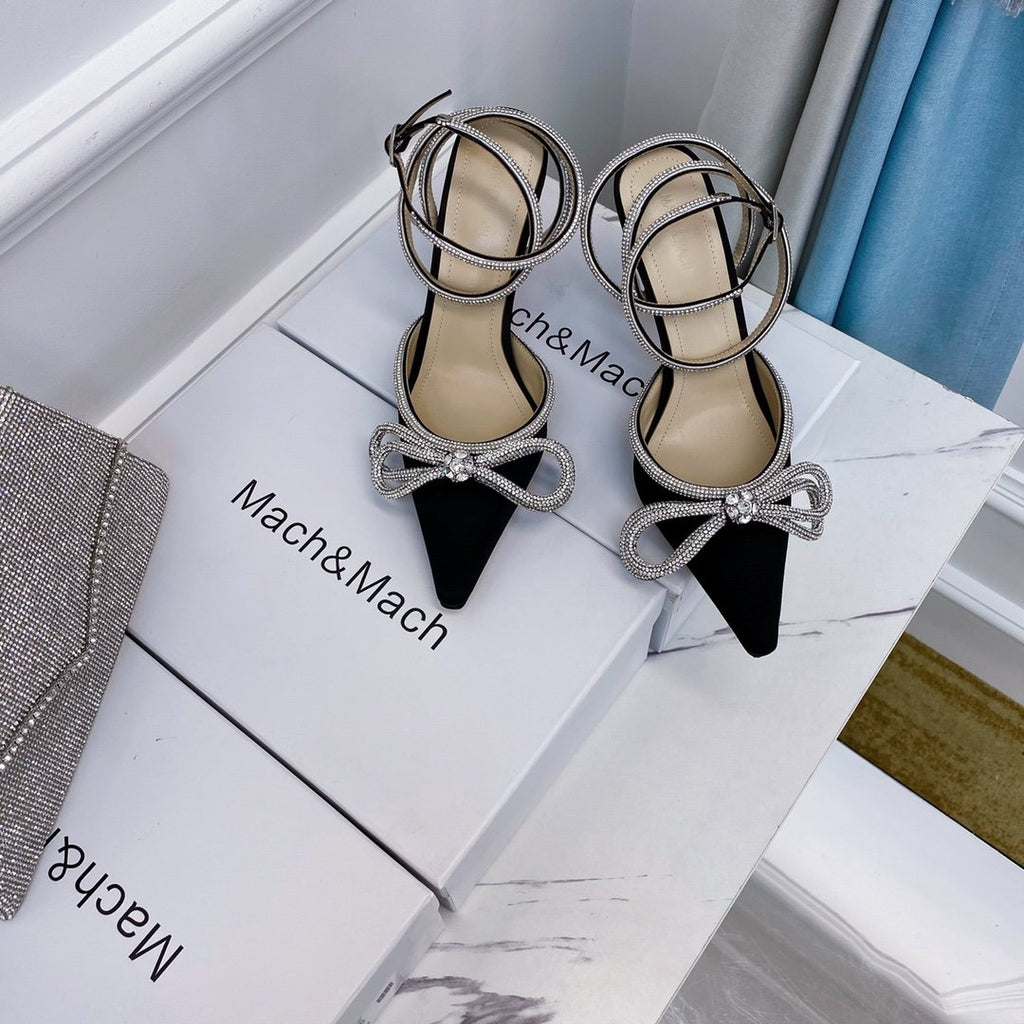 Black double bow pumps