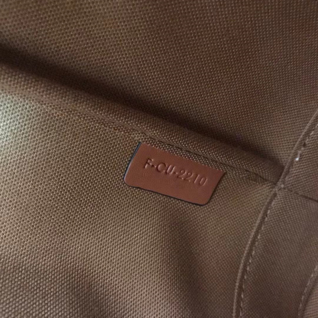 Tan C medium bucket bag