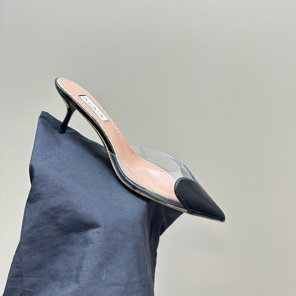 Black LC Mules In Patent Leather