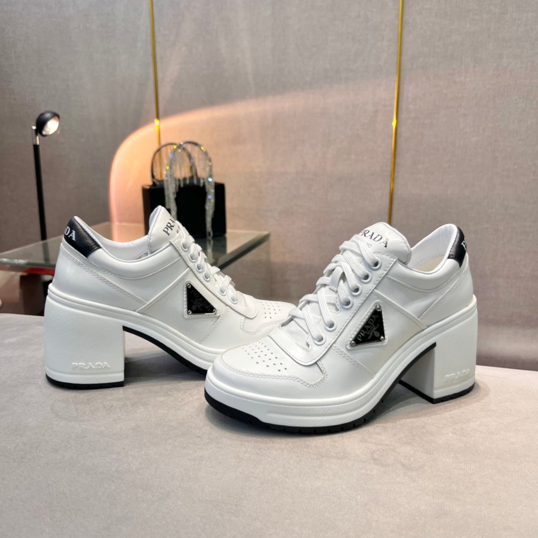 White PD high-heeled leather sneakers