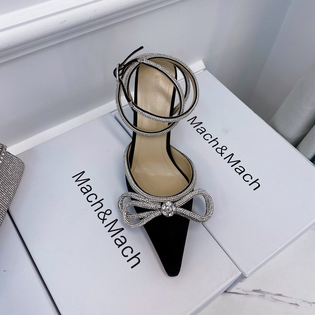 Black double bow pumps