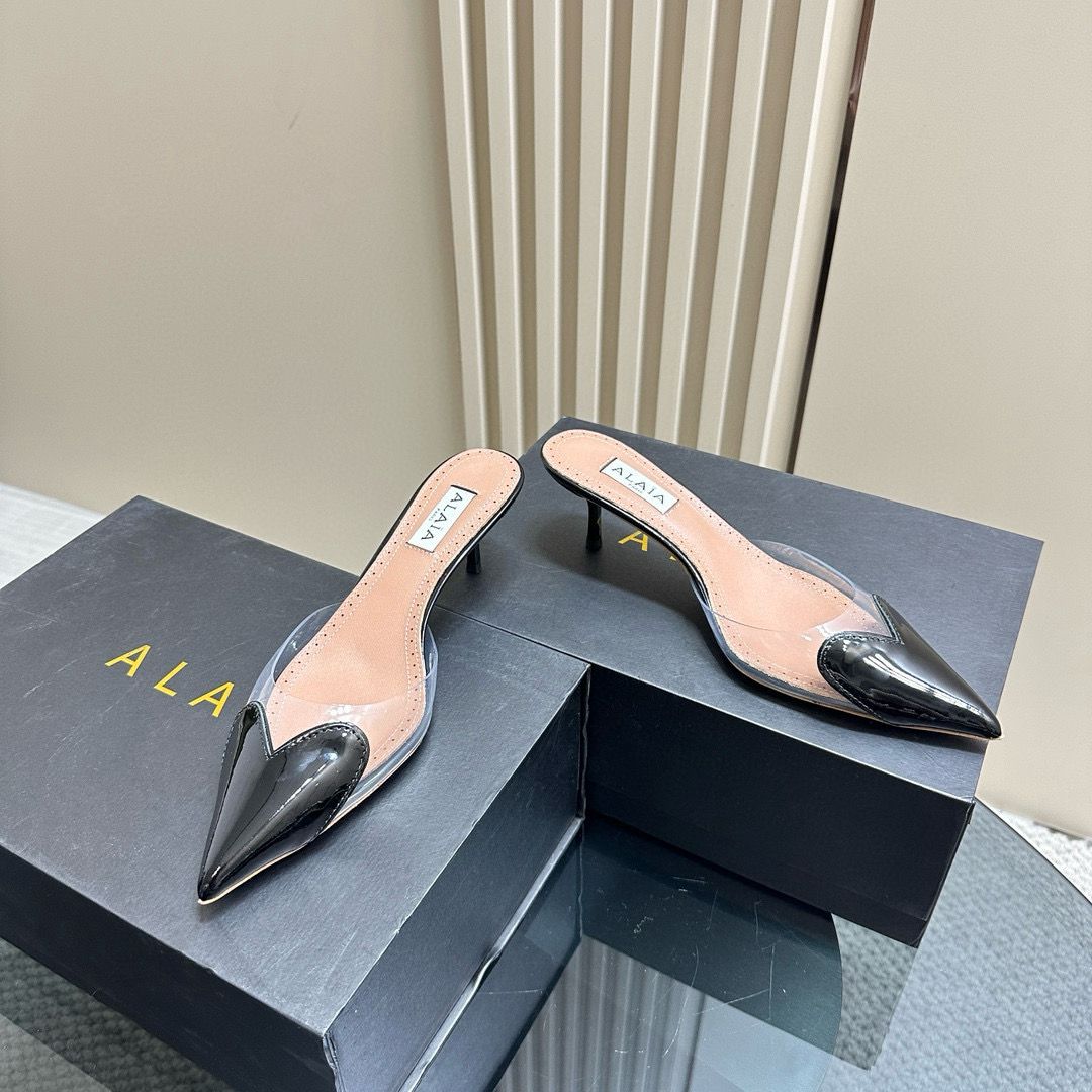 Black LC Mules In Patent Leather
