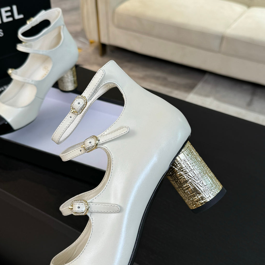 Ivory & Black MJ Pumps