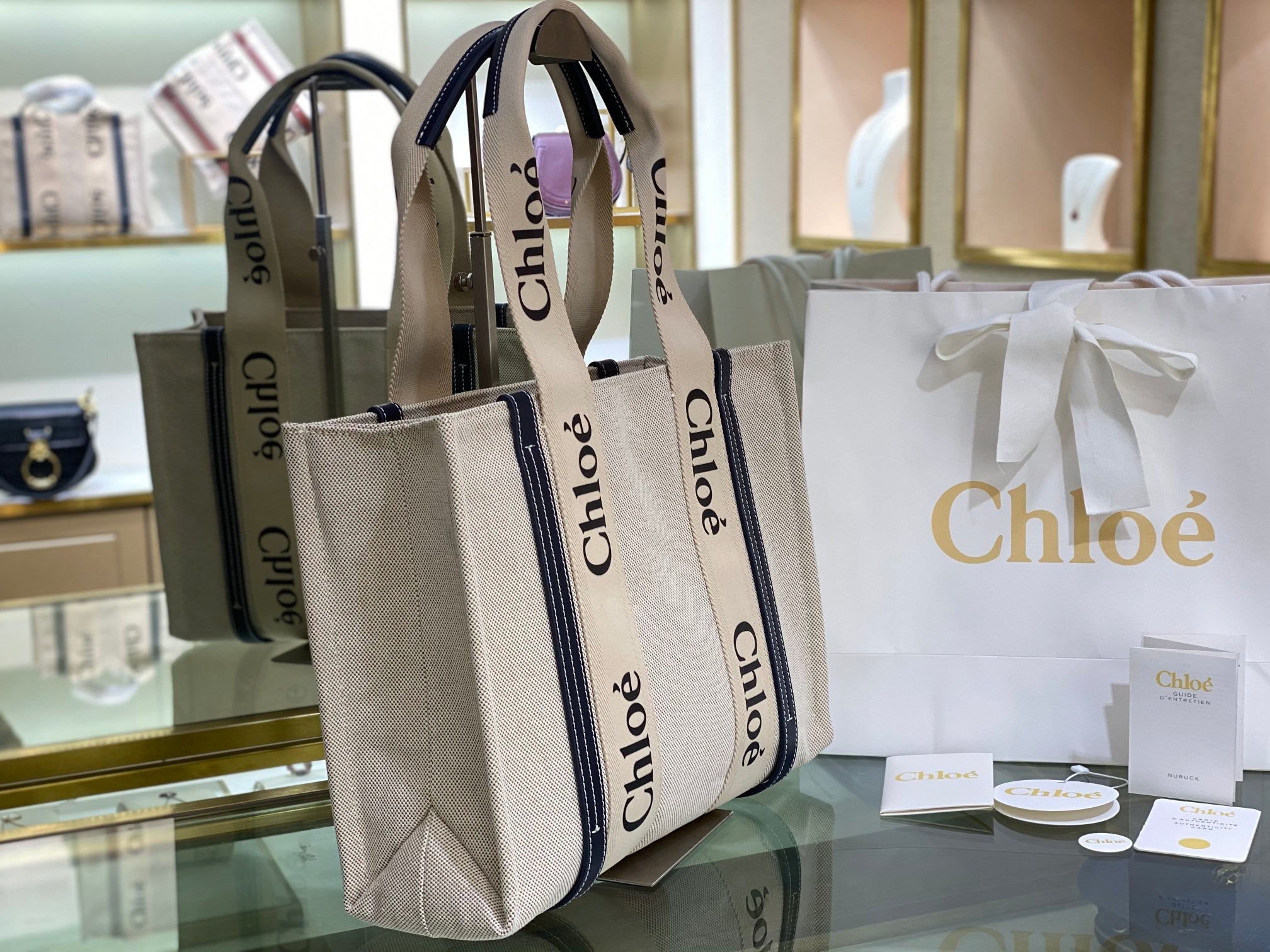 CW medium navy leather-trimmed cotton-canvas tote