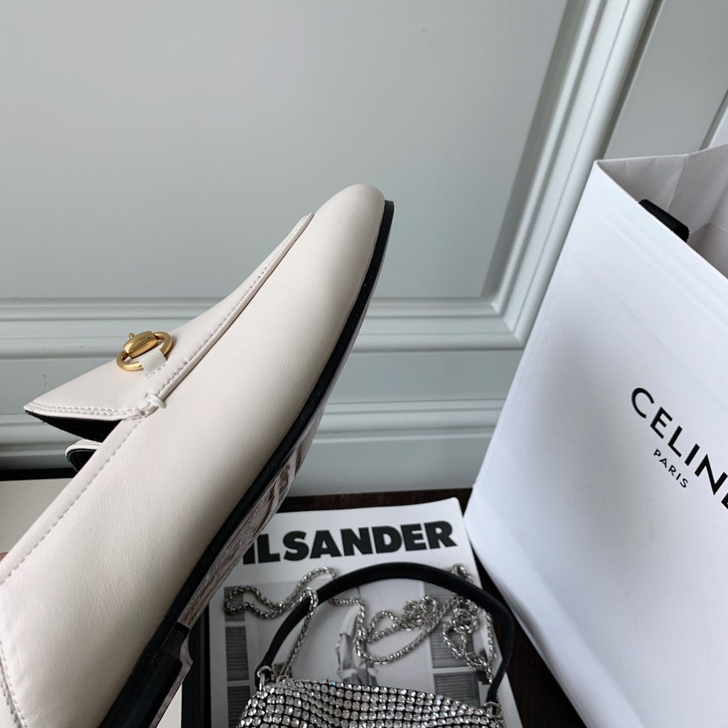 White leather loafer