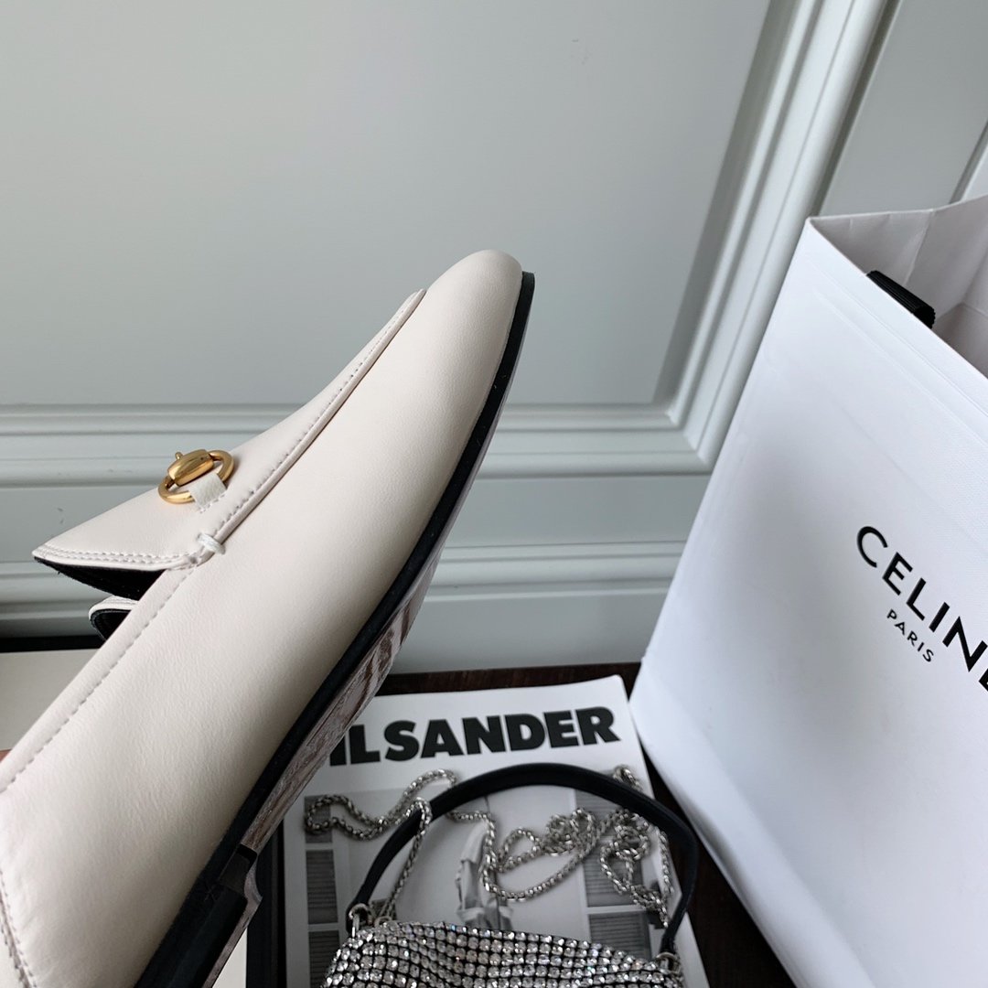 White leather loafer