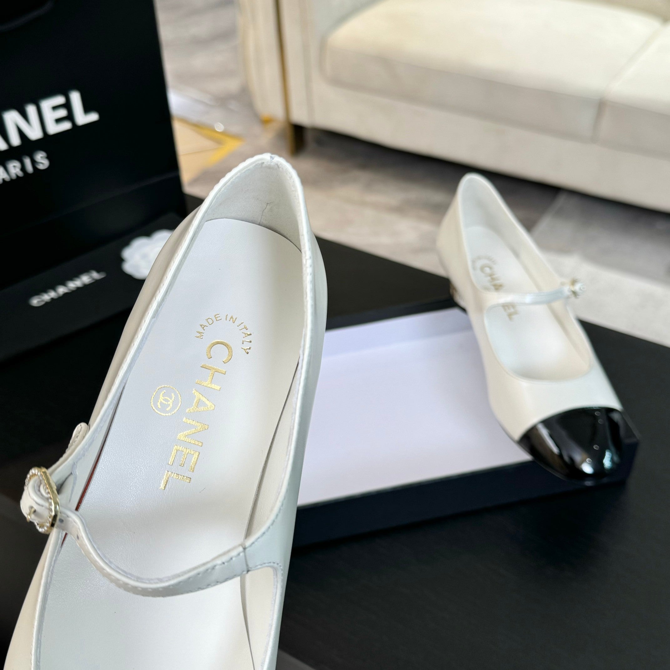 Ivory And Black MJ Pumps