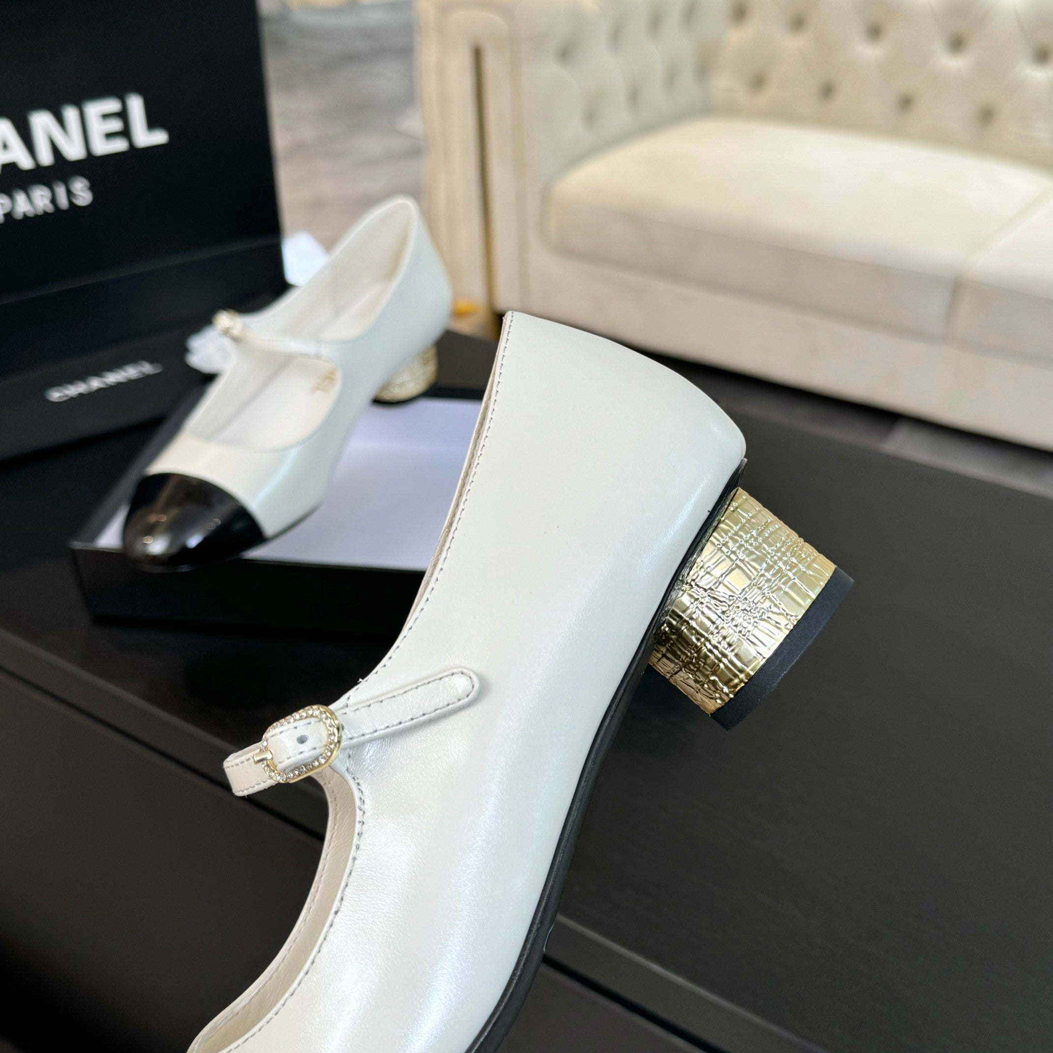 Ivory And Black MJ Pumps