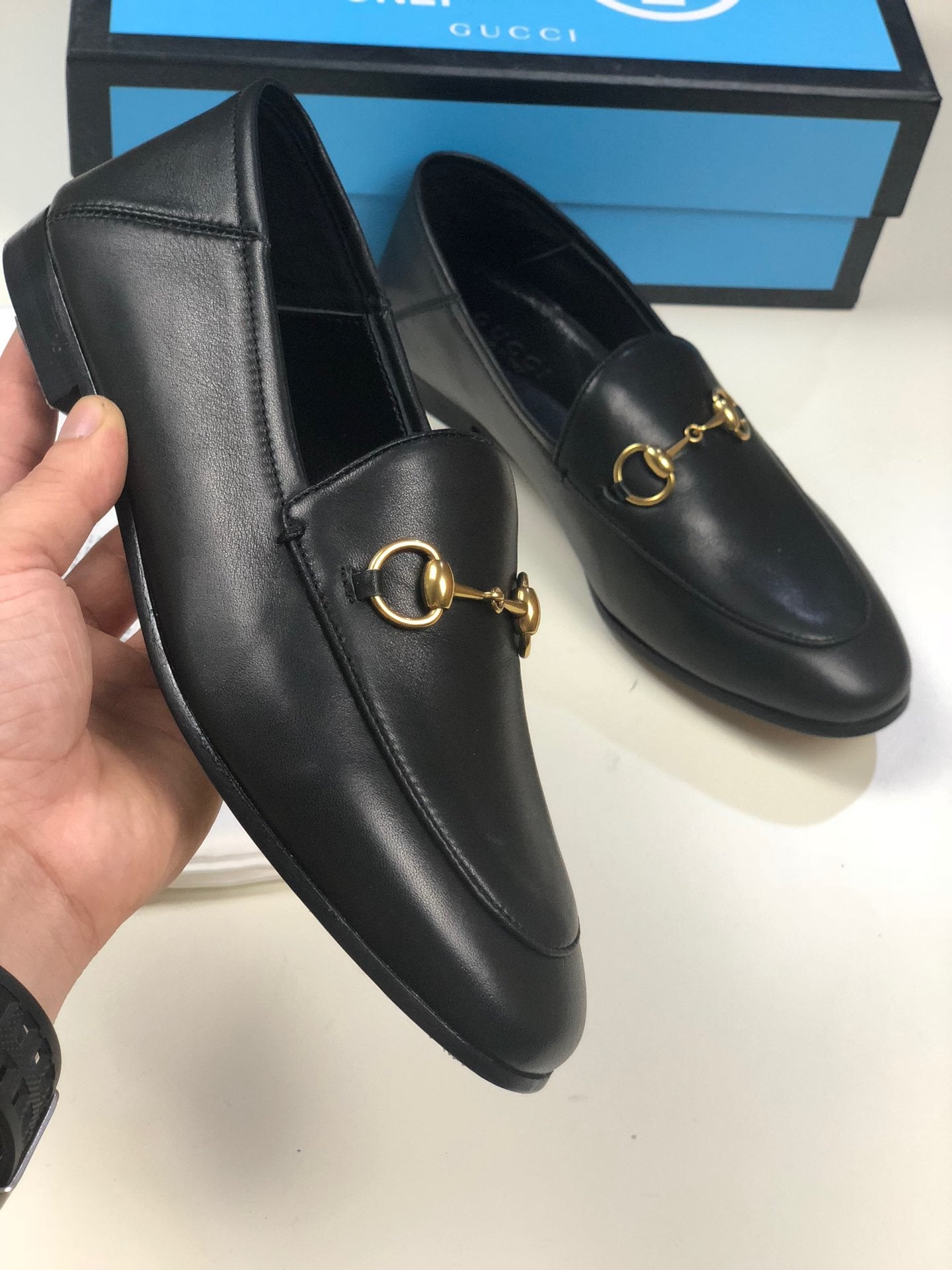 Black GB leather collapsible-heel loafers
