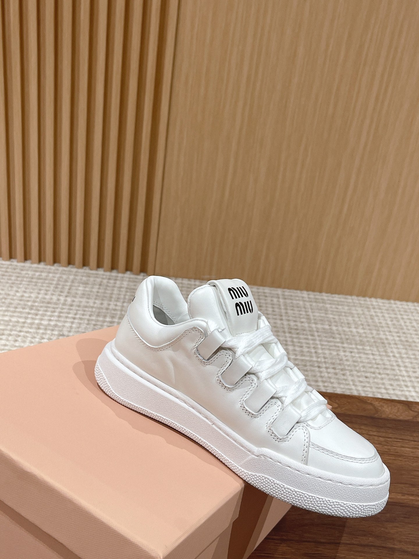 White M leather sneakers