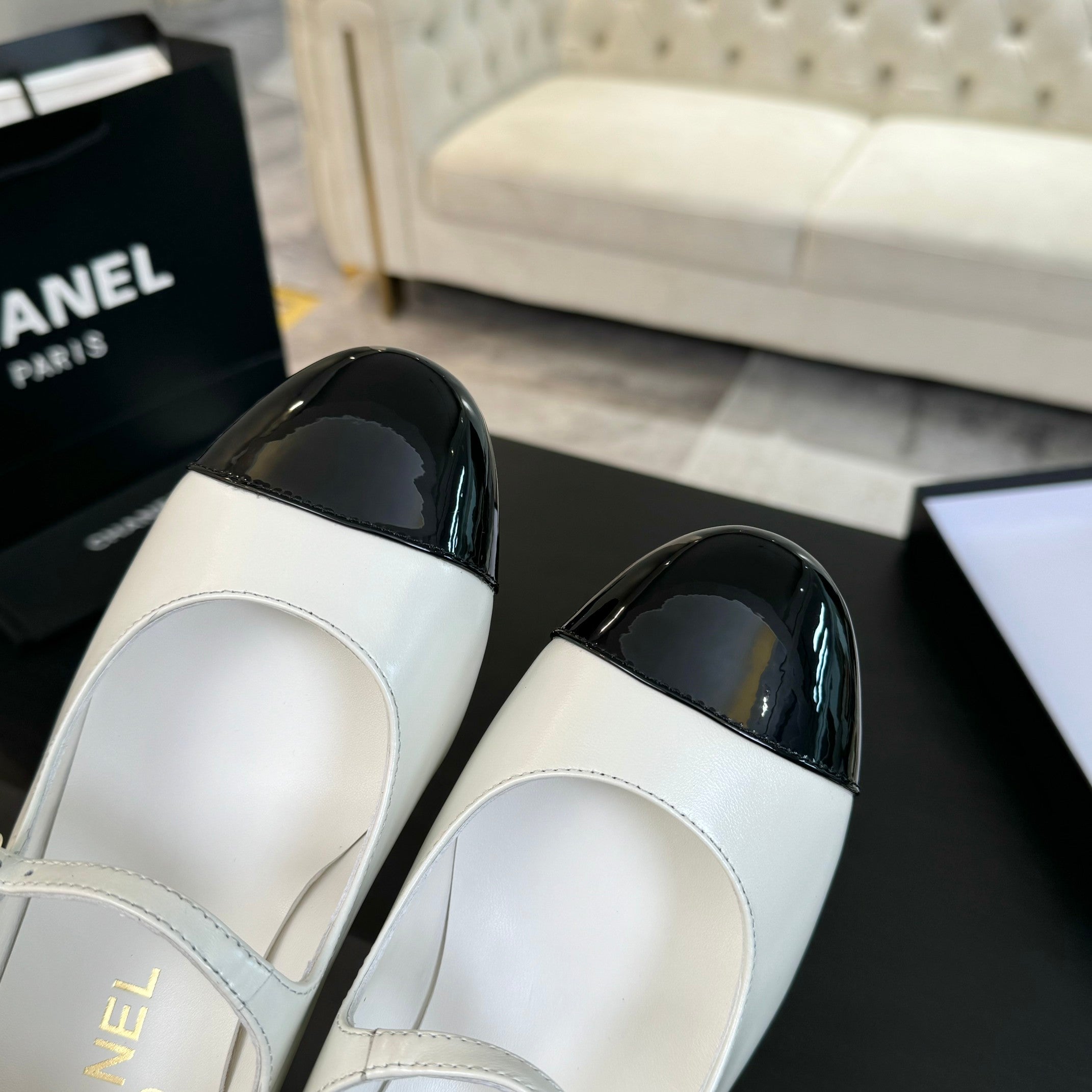 Ivory And Black MJ Pumps