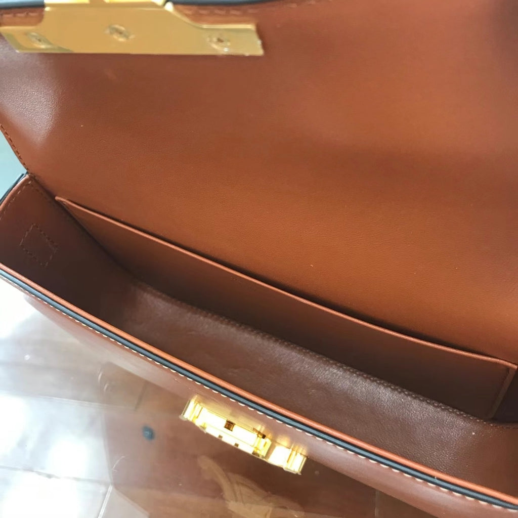 Tan triomphe shoulder bag