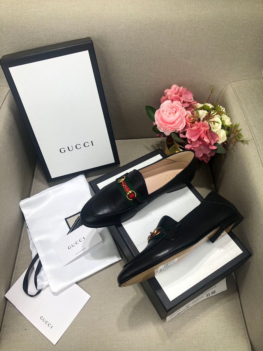 Black loafer with web