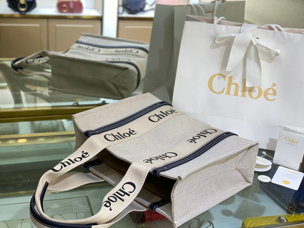 CW medium navy leather-trimmed cotton-canvas tote