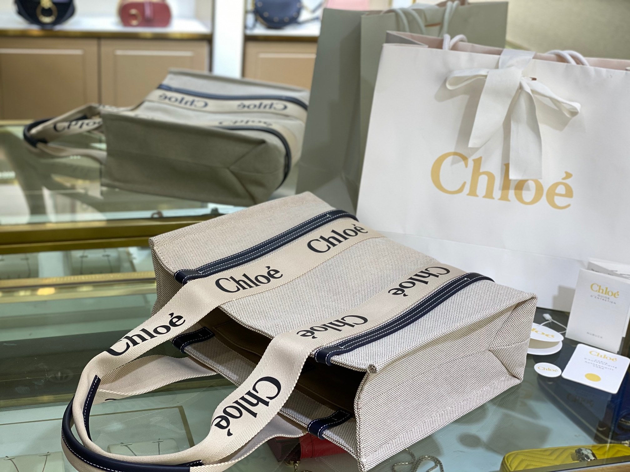 CW medium navy leather-trimmed cotton-canvas tote