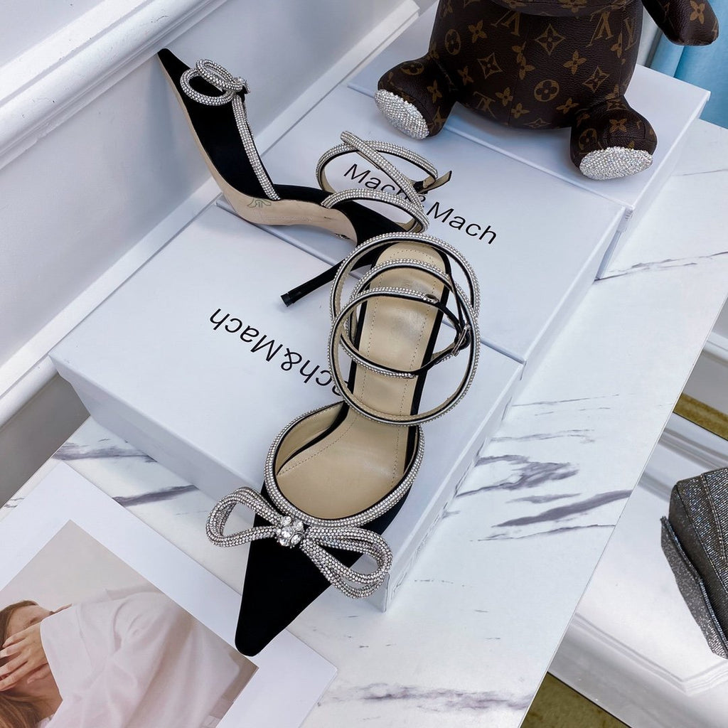 Black double bow pumps