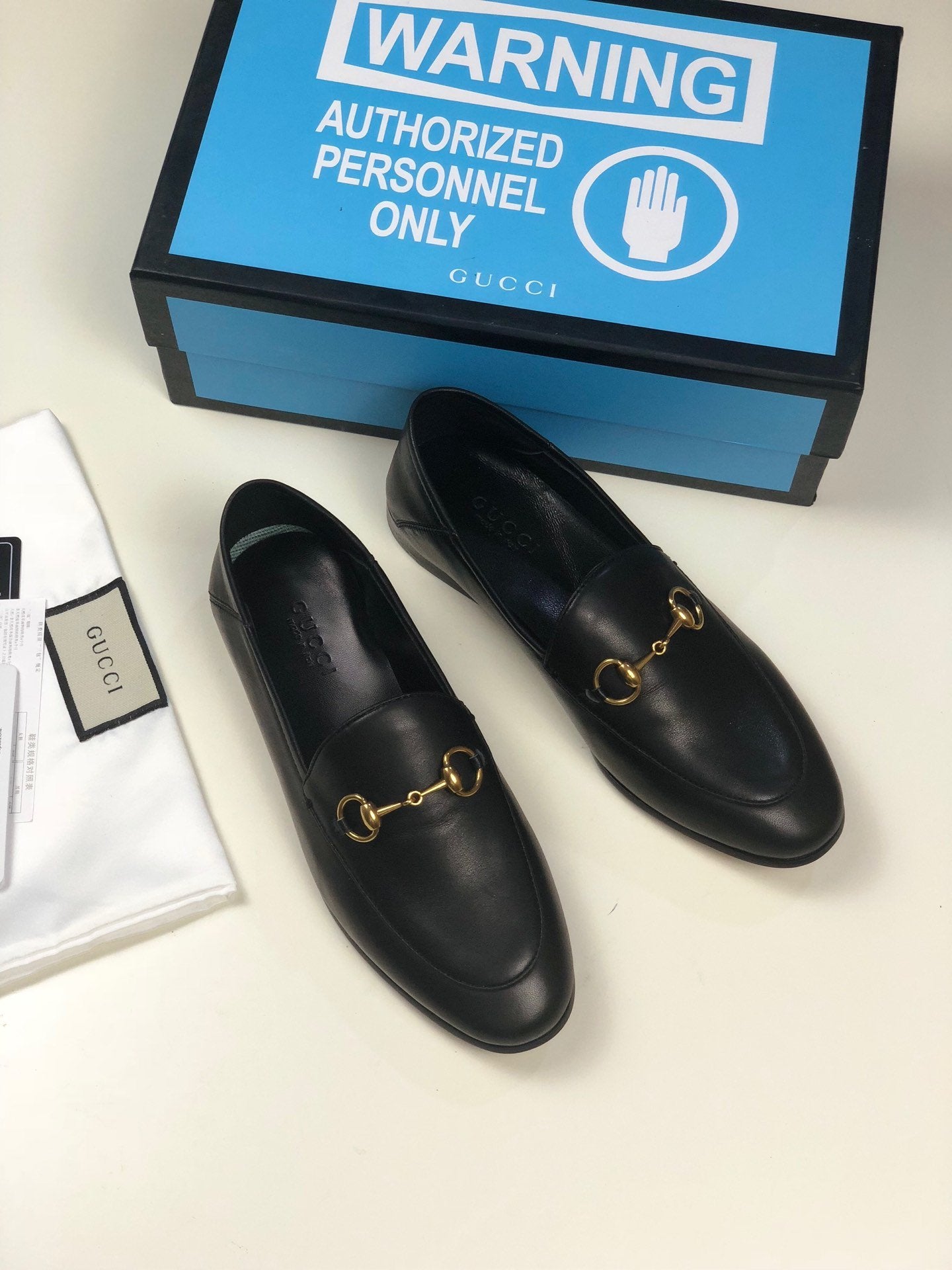 Black GB leather collapsible-heel loafers