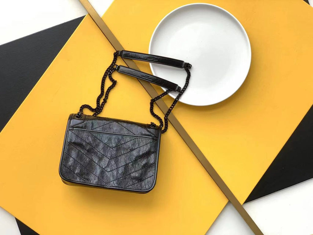 Black Baby In Vintage Leather