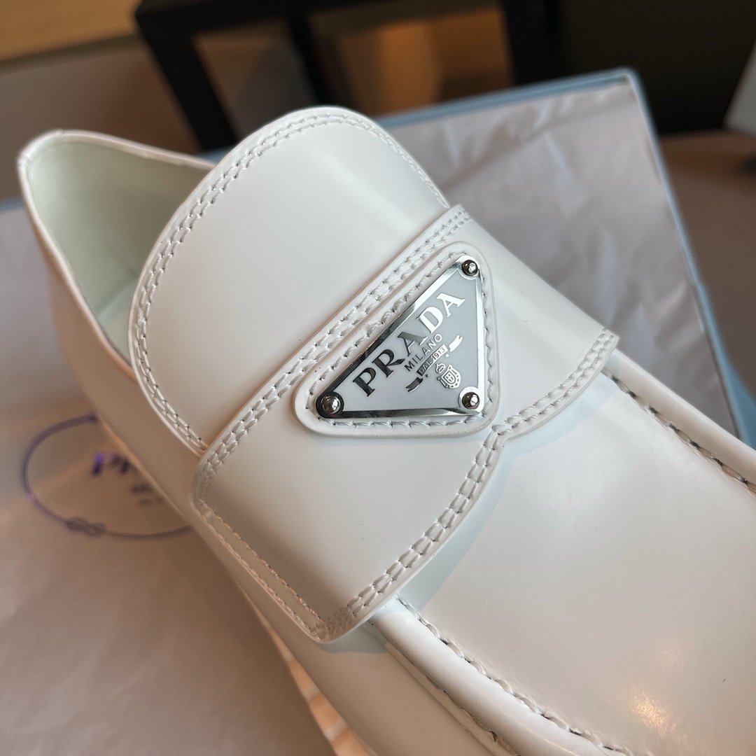 White brushed leather loafers