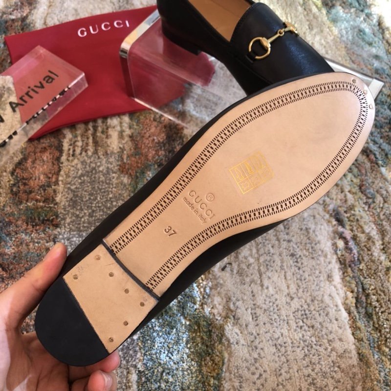 Black GJ leather collapsible-heel loafers