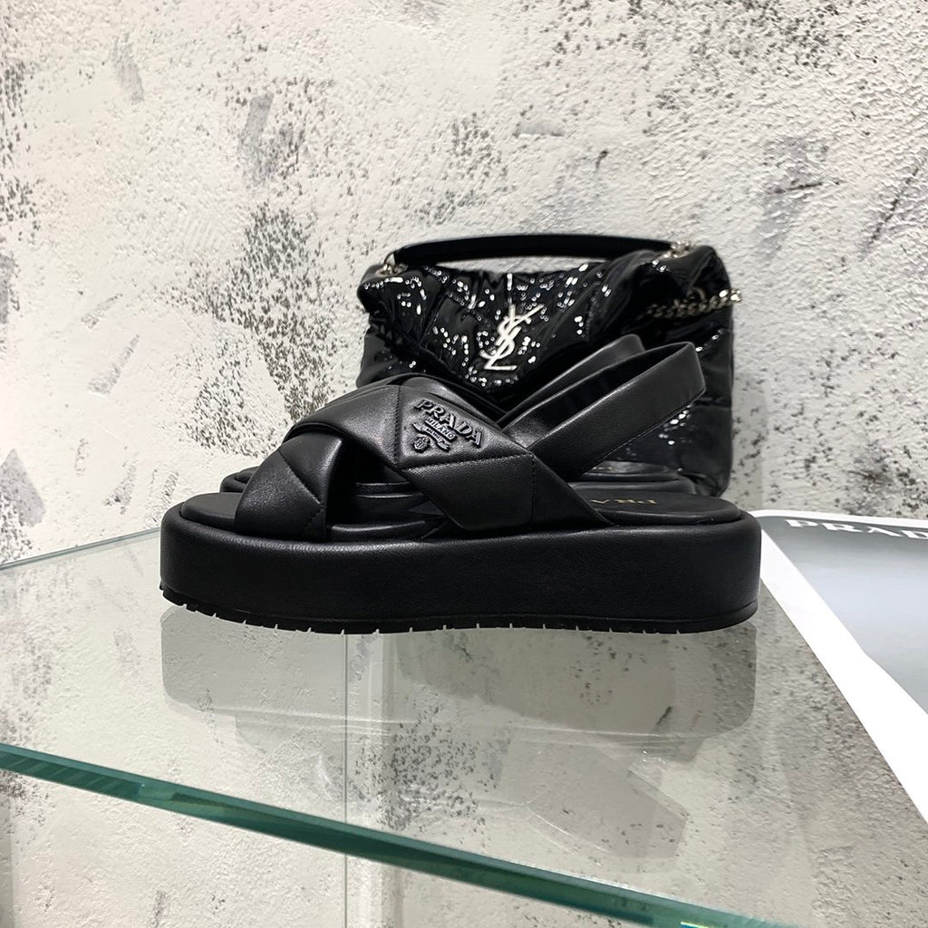 Black quilted flatform sandals