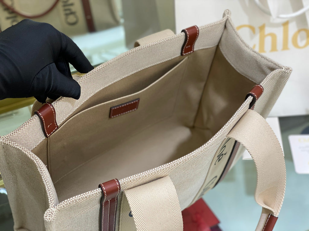 CW medium brown leather-trimmed cotton-canvas tote