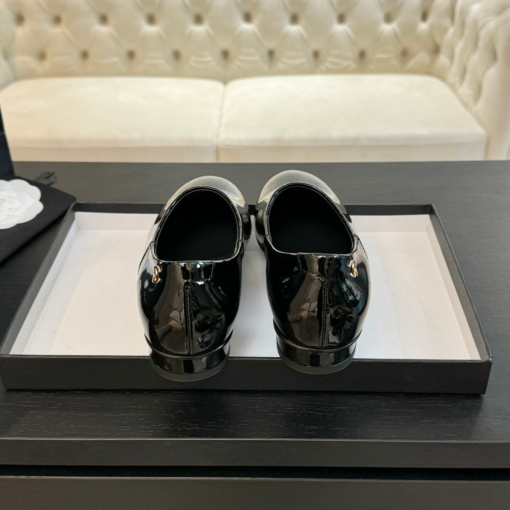 Black Moccasins In Patent Leather