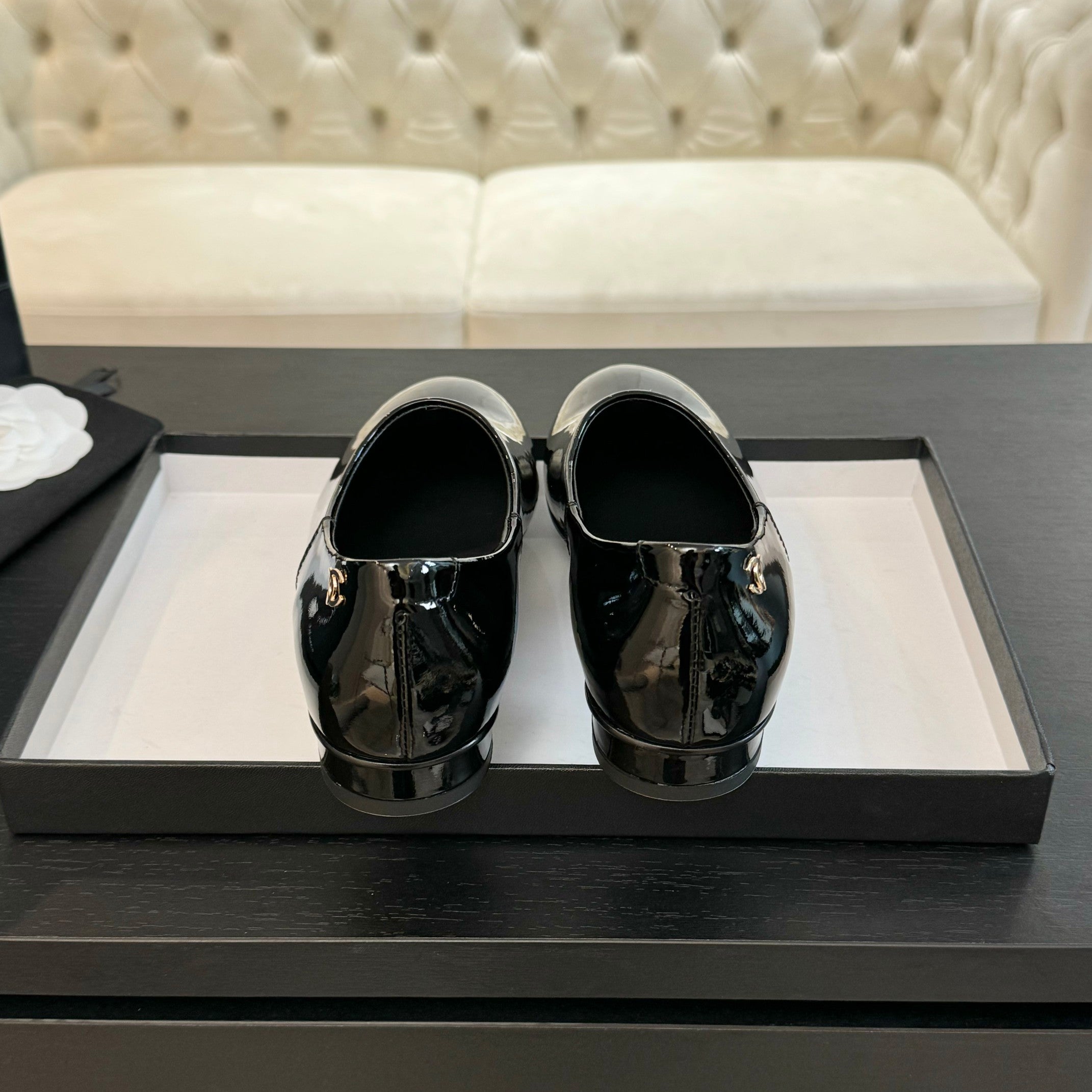 Black Moccasins In Patent Leather