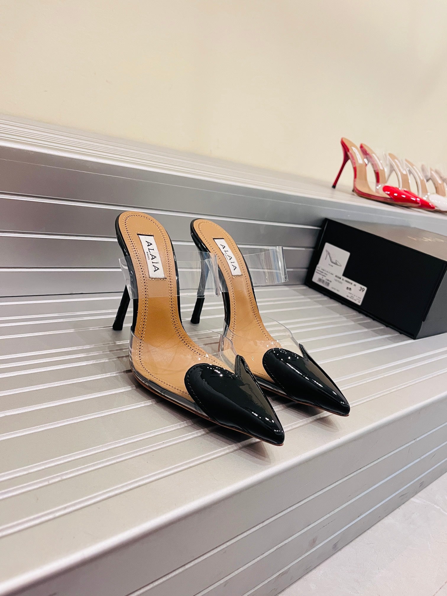 Black LC Mules In Patent Leather