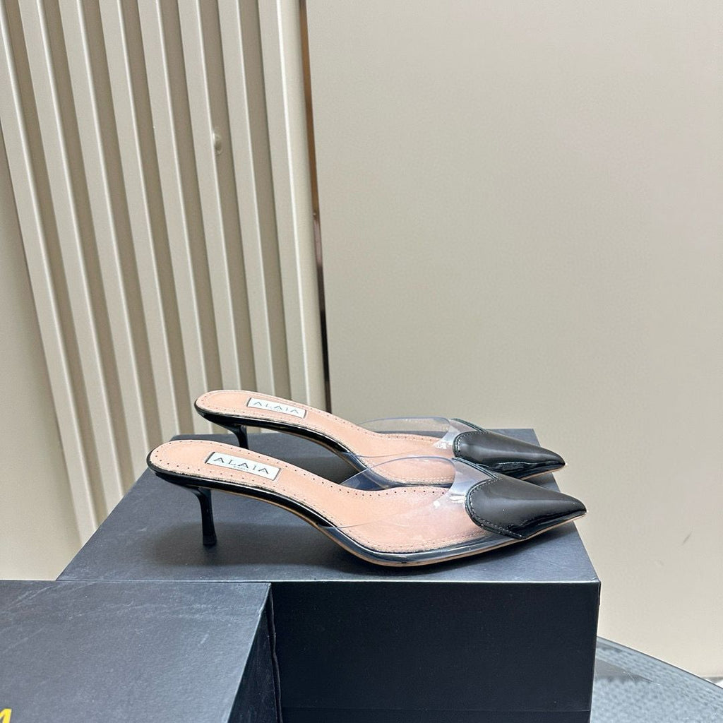 Black LC Mules In Patent Leather