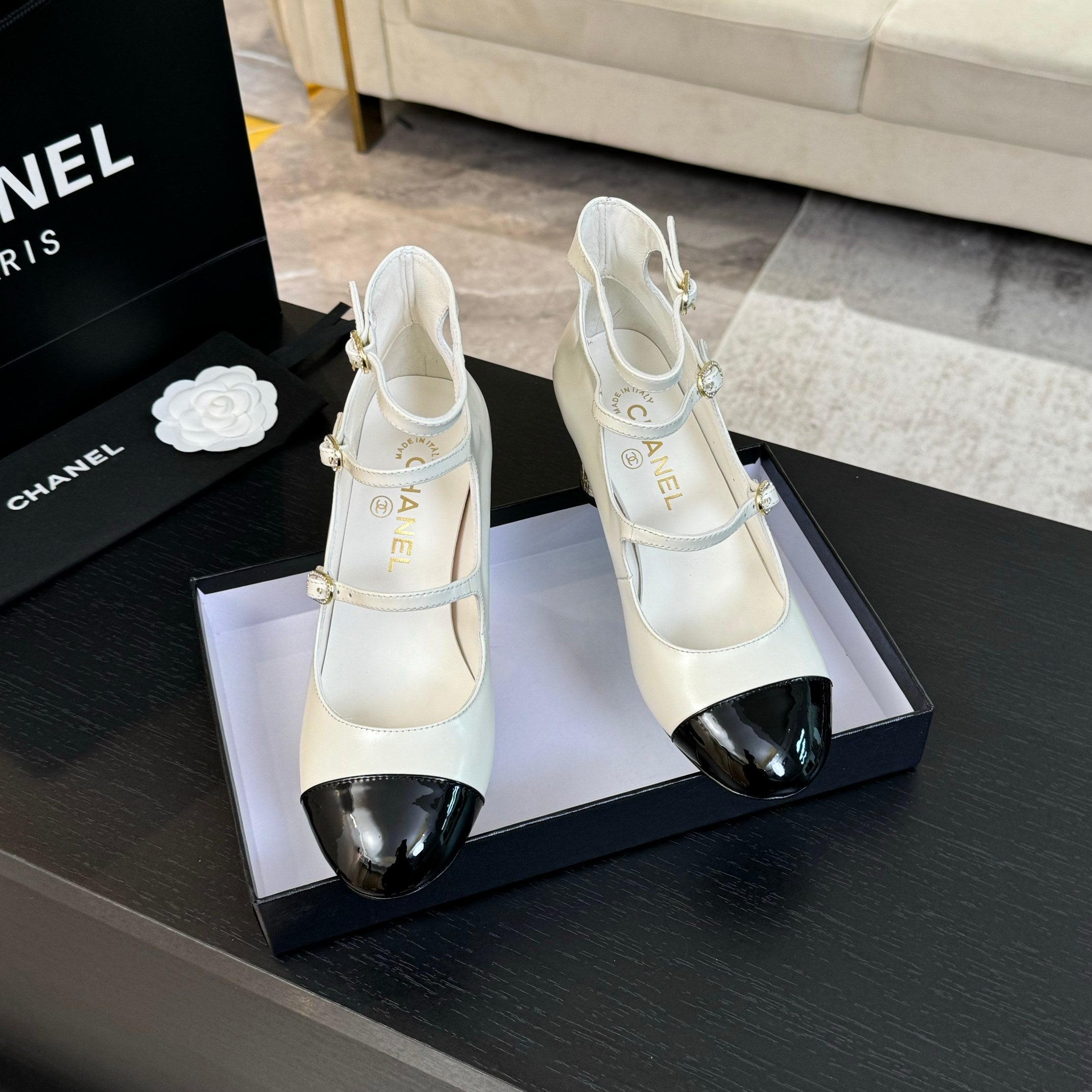 Ivory & Black MJ Pumps