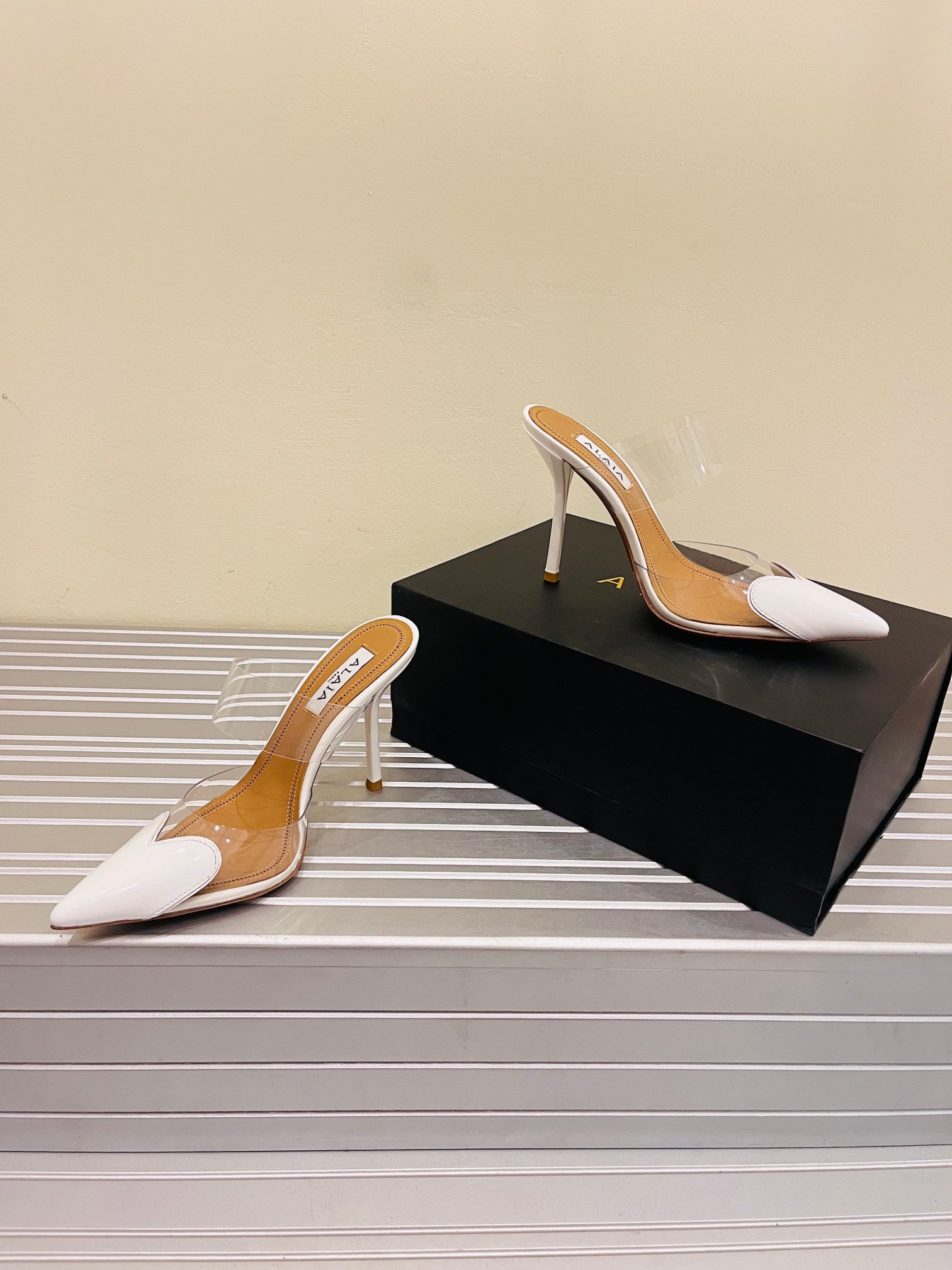 Optic White LC Mules In Patent Leather