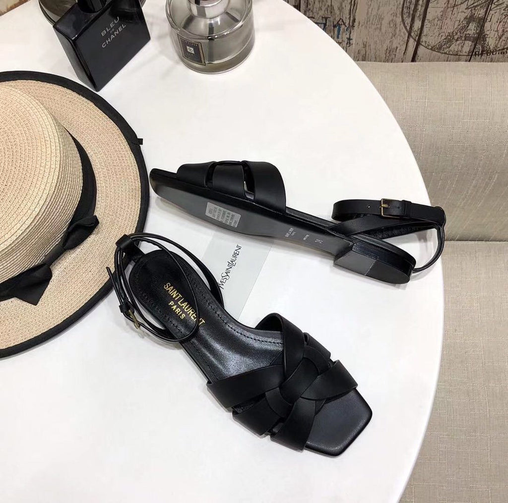 YT flat sandals in black leather