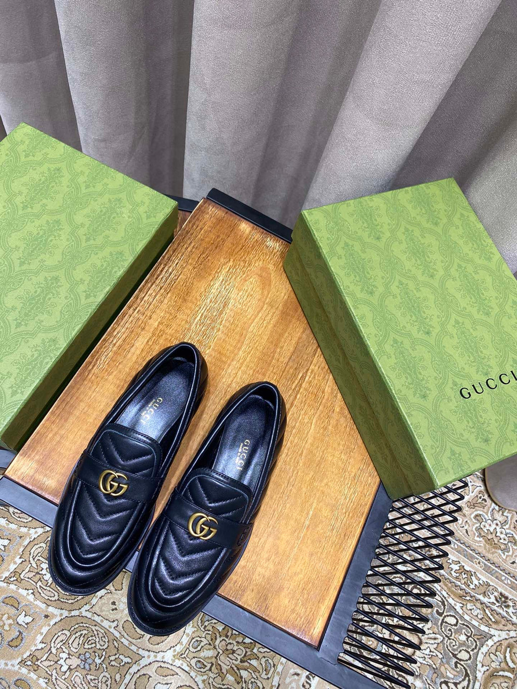 Black chevron matelassé loafers