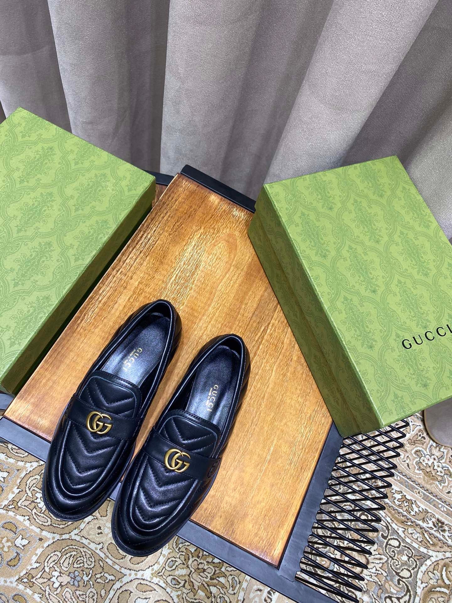 Black chevron matelassé loafers