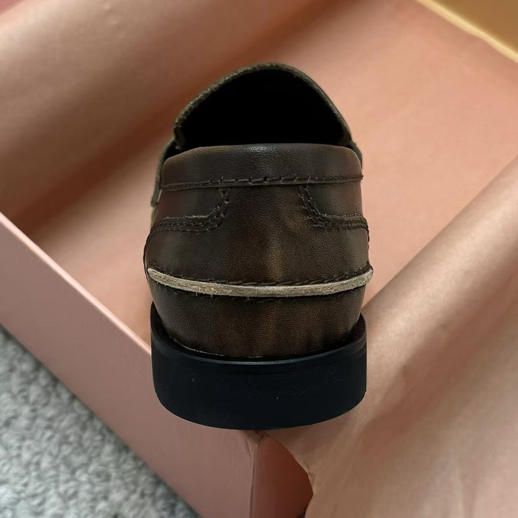 Ebony Vintage-Effect Leather Penny Loafers