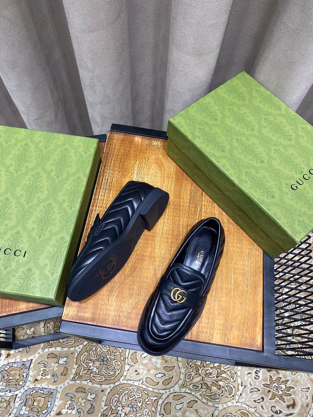 Black chevron matelassé loafers