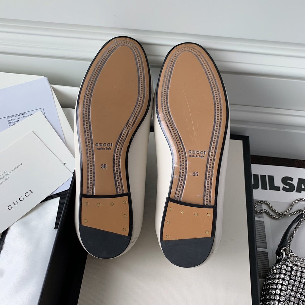 White leather loafer